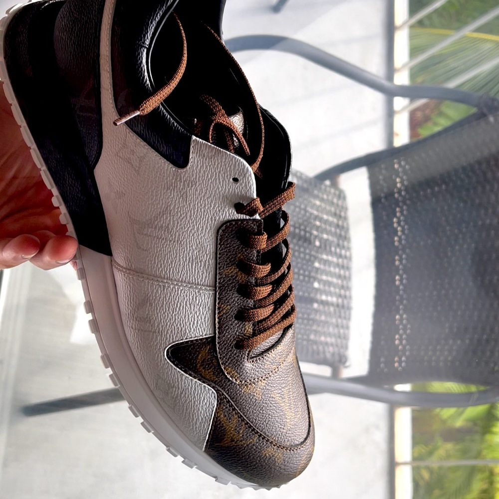 Brand new never worn Louis Vuitton runway sneakers.